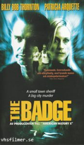 Badge (The)